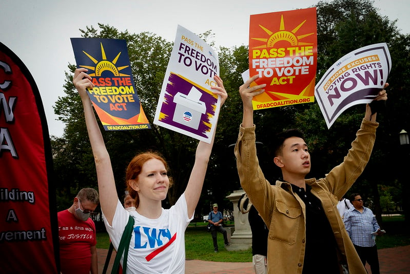 People protesting for the Freedom to Vote Act